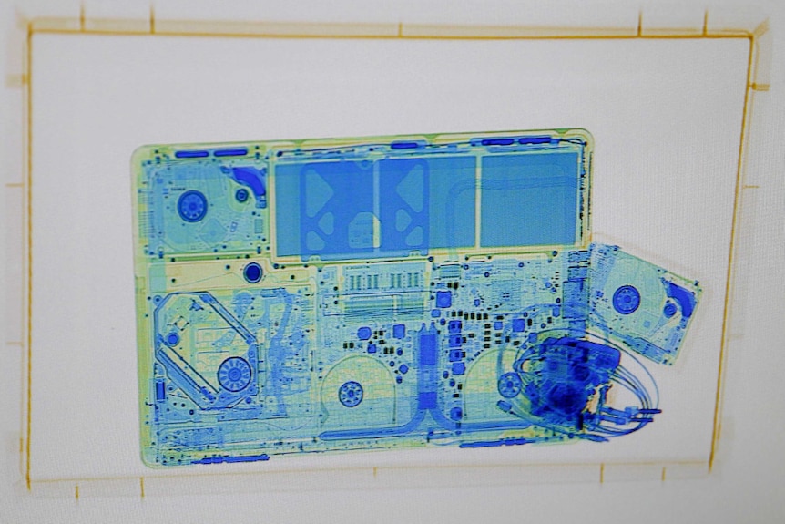 X-ray image of laptop in an airport scanner