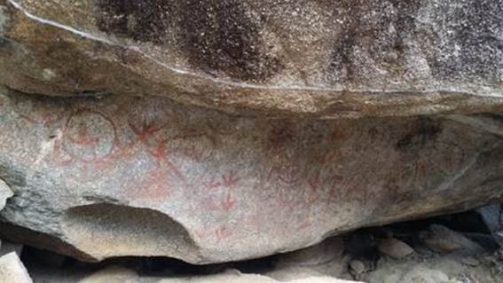 Art carved into a rock.