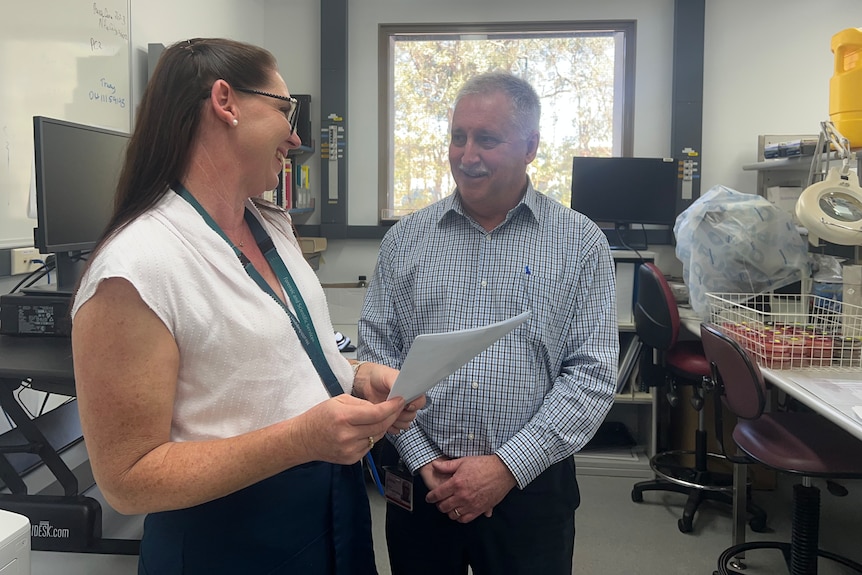 Dr Amy Jennison and Dr Russell Stafford in a science lab