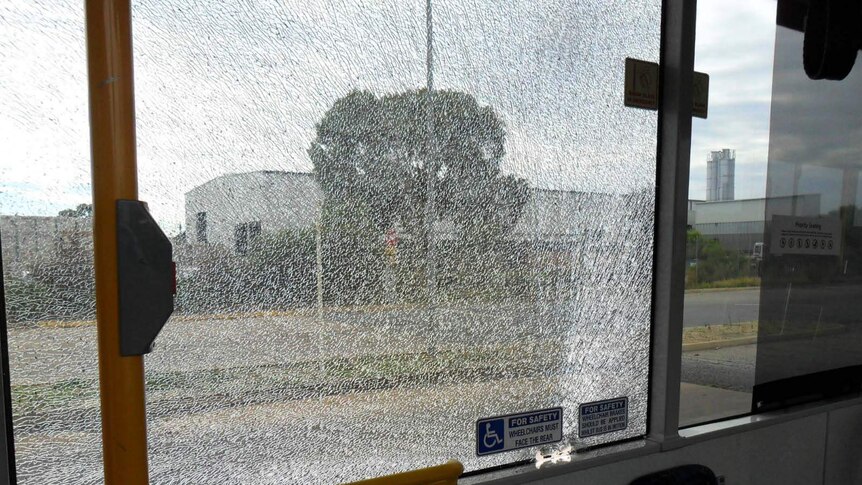 Bus window damaged by rock
