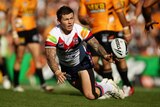 Last-gasp effort: Todd Carney's try with five minutes to go stole victory from the Tigers.