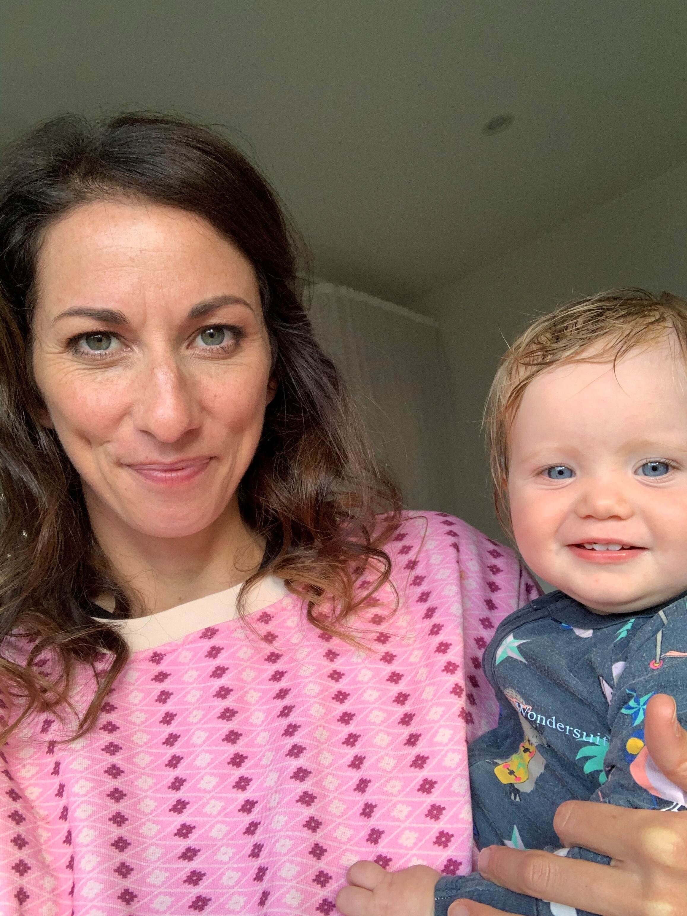 Close up of a woman and baby for a story about mistakes to avoid when trying to buy a house.