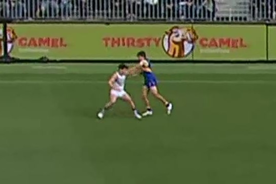 Andrew Gaff punches Andrew Brayshaw