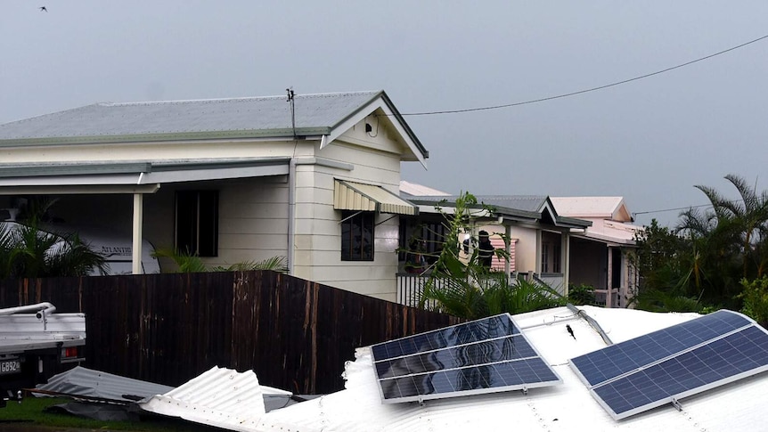 A roof equipped with solar panels was ripped from a house in Bowen, most of the town has found itself largely intact.