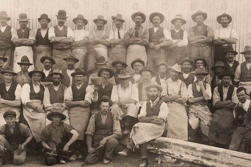 A group of stonemasons on Collins Street in Melbourne in 1900. 