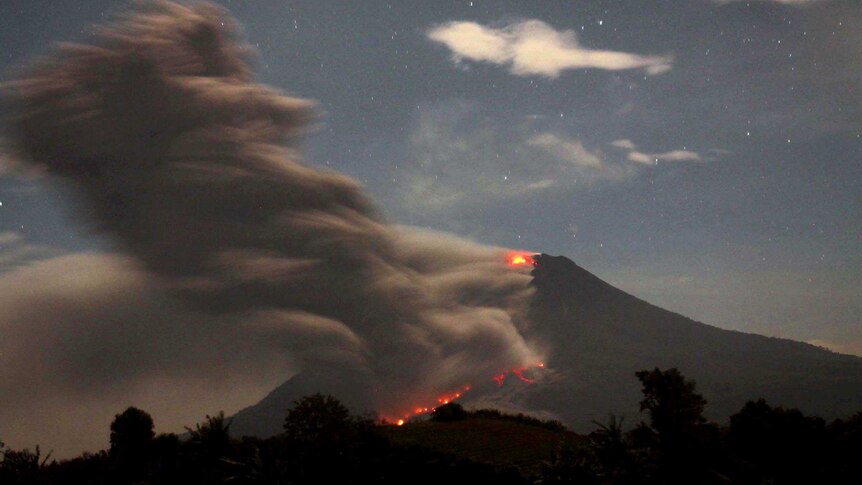 Mount Sinabung spews volcanic ash and lava near Karo, North Sumatra.