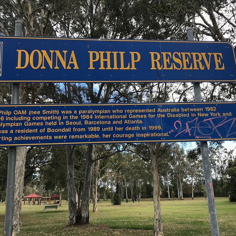 A sign at the front of a park to honour late Paralympian Donna Philp