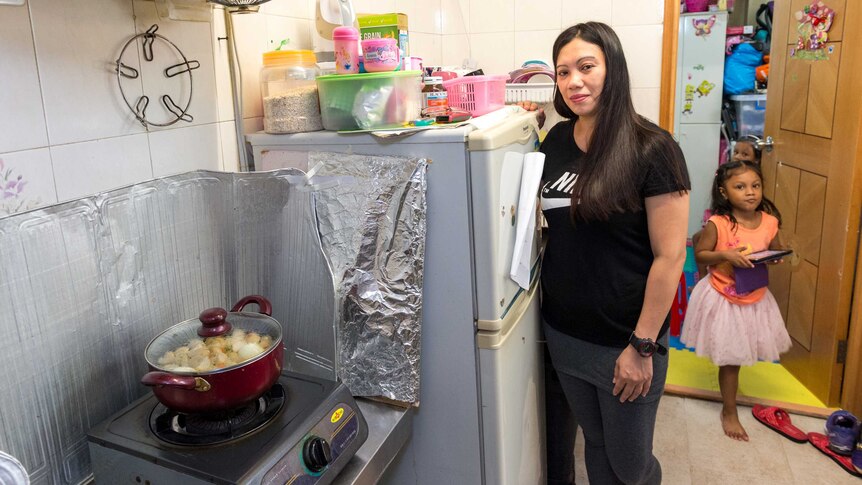 Vanessa Rodel and Keana are in the kitchen of their Hong Kong flat.