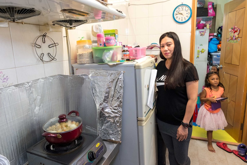 Vanessa Rodel and Keana are in the kitchen of their Hong Kong flat.