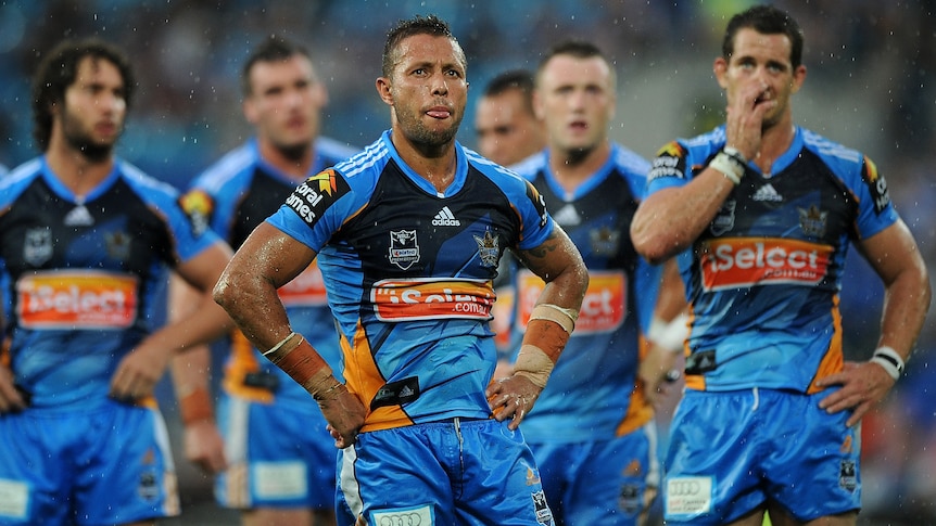 The Titans insist Scott Prince (centre) is still welcome at the club.
