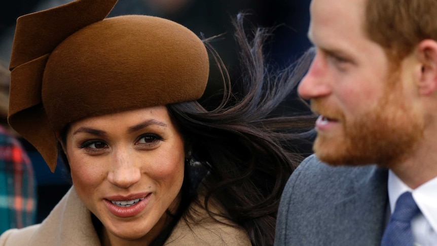 Prince Harry and his fiancee Meghan Markle arrive to attend Christmas Day church service