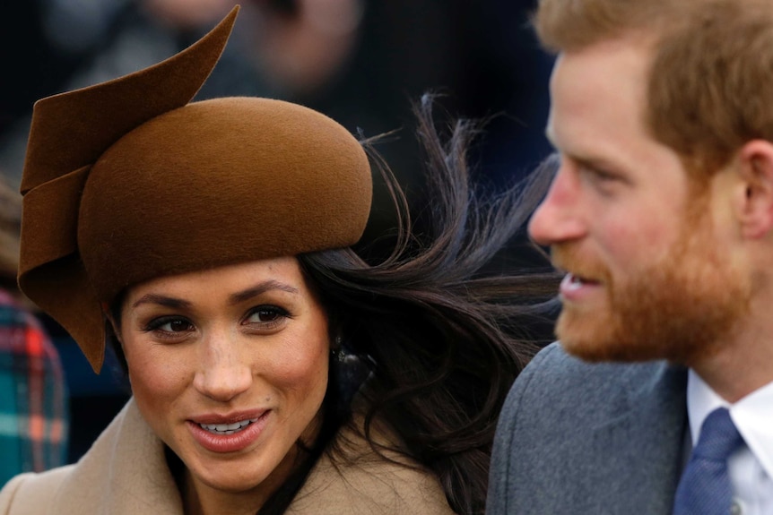 Prince Harry and his fiancee Meghan Markle arrive to attend Christmas Day church service