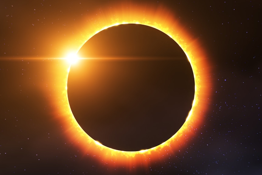 A solar eclipse showing the dark moon framed by the golden sun