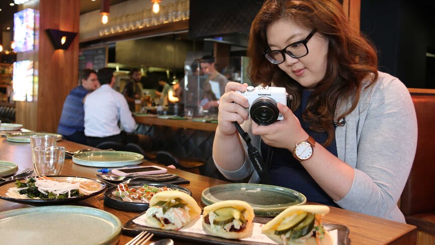Public servant by day and food blogger by night, Eileen Tang, at Akiba restaurant in Canberra.