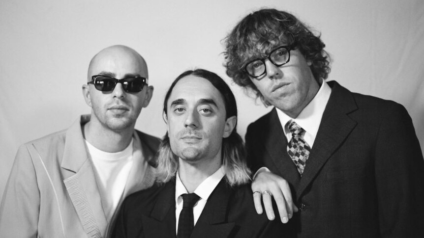 Black and white photo of the three members from Big Words 