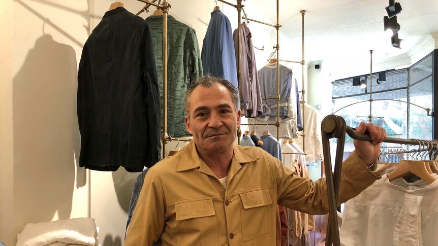 Man in clothing store