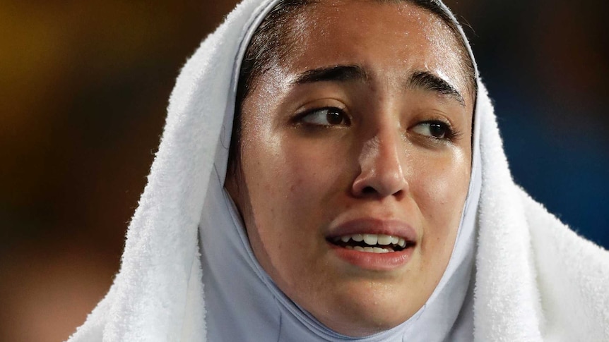 In this file photo from 2006, Kimia Alizadeh cries following a loss at the 2016 Summer Olympics in Rio.