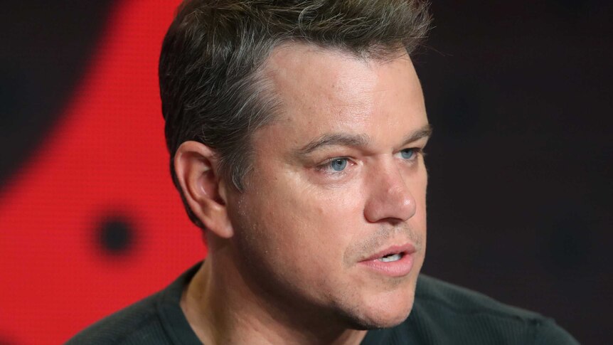 Close up of actor Matt Damon looking serious.