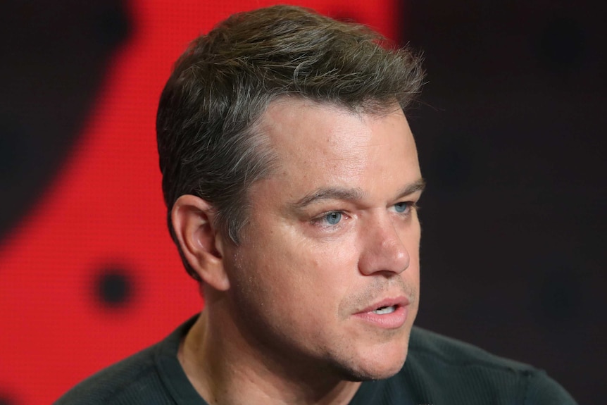 Close up of actor Matt Damon looking serious.