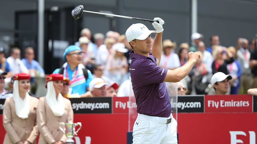Jordan Spieth lets go of the club on his drive on the first at the Australian Open