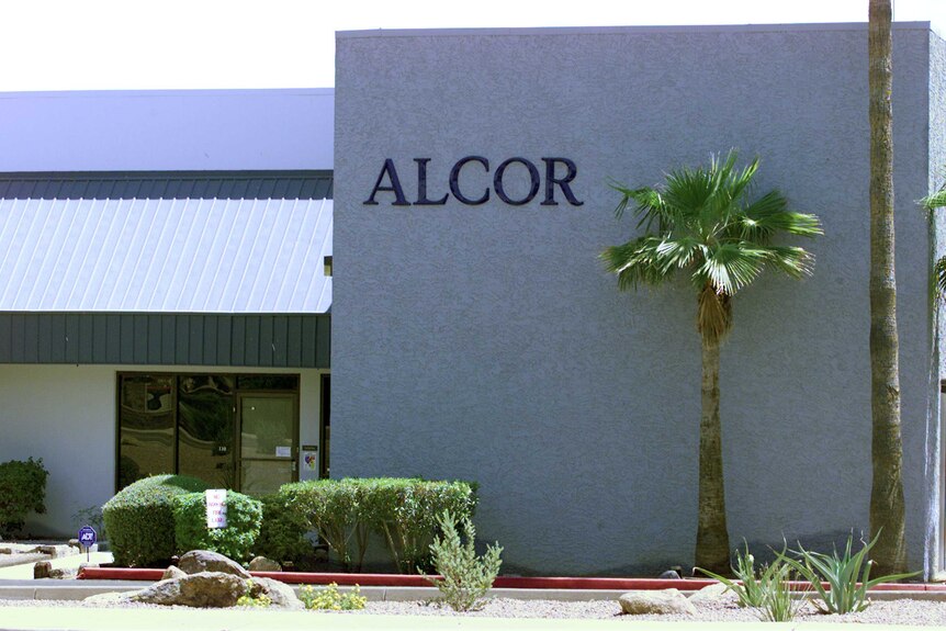 The outside of a building with the Alcor Life logo imprinted on its surface