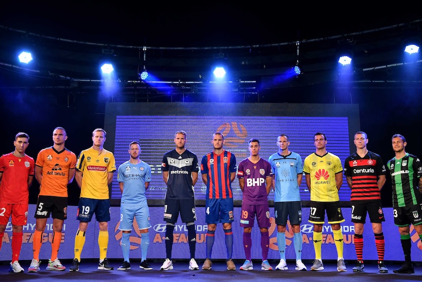 Captains from soccer teams line up for the cameras at the 2019-2020 A-League launch.