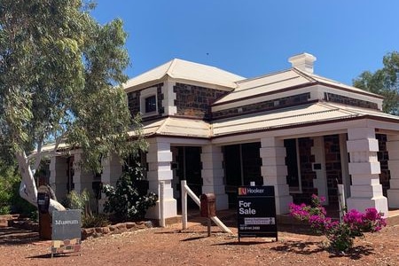 One of the many Heritage Listed buildings at the Cossack town site with a For Sale sign