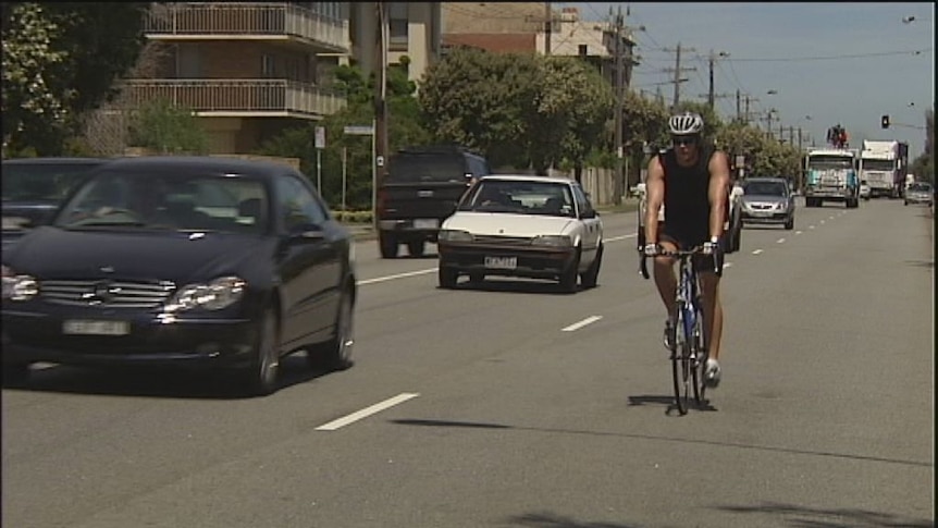 Cyclist and car