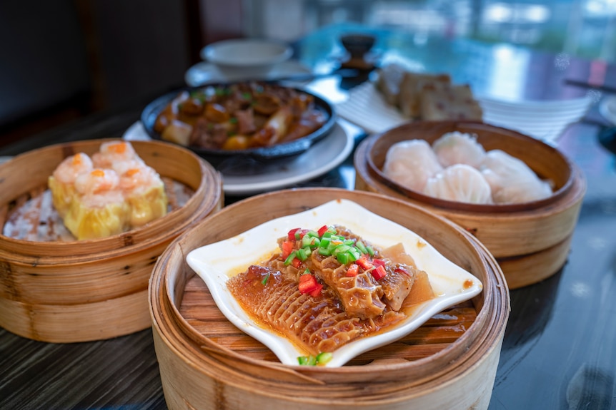 Close up variation of dim sum and tripe in a restaurant.