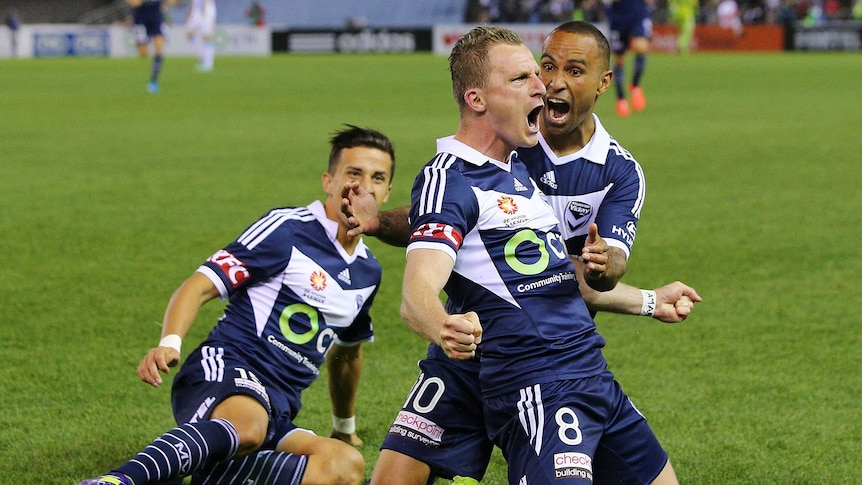 Besart Berisha (C) celebrates a goal for Melbourne Victory against Melbourne City at Docklands.