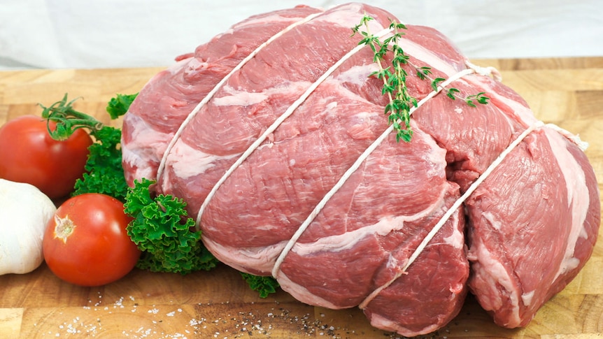 A boneless leg of lamb prepared for a roast.