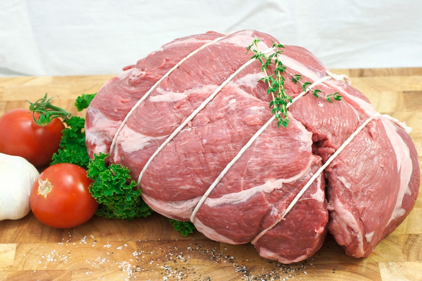 A boneless leg of lamb prepared for a roast.