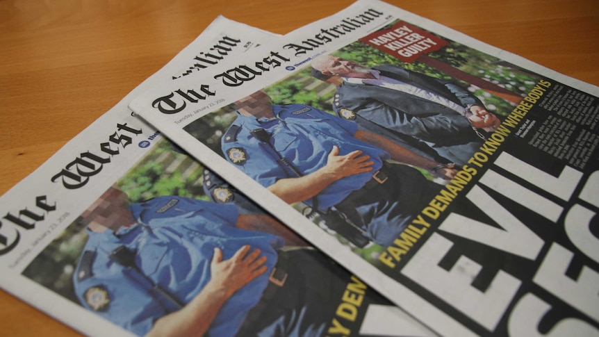 Two copies of The West Australian newspaper laying on a coffee table.
