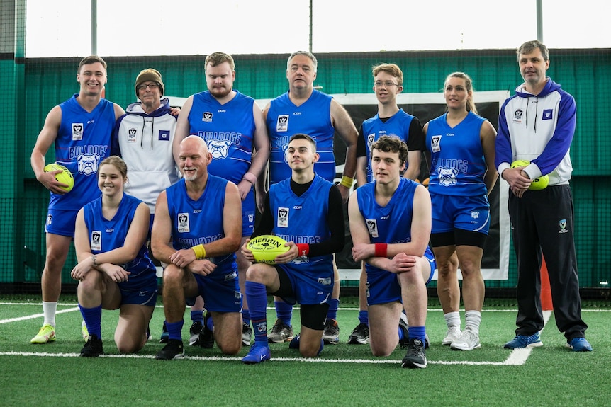 A team photo of the Bulldogs AFL Blind team.