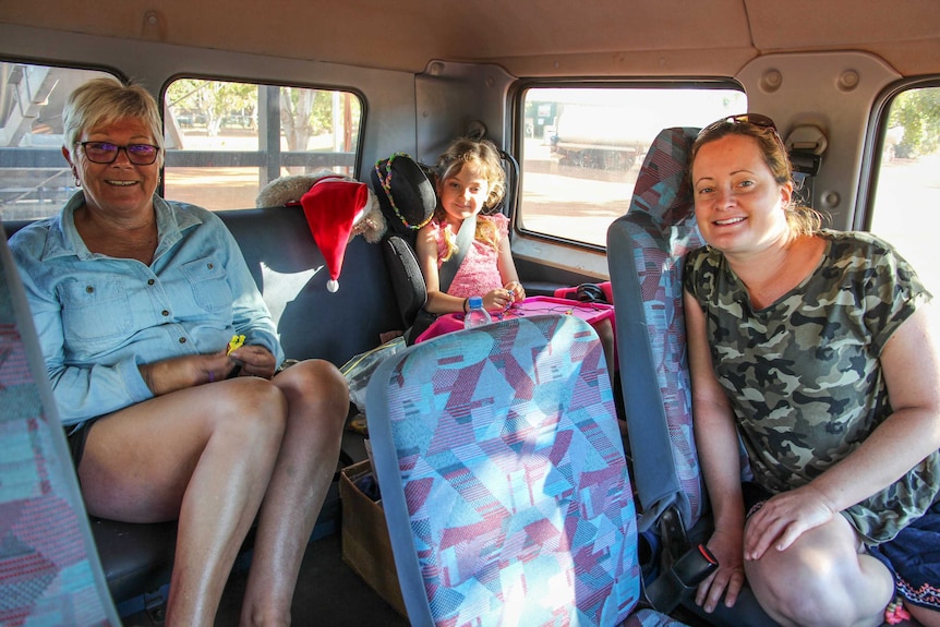 Robin Chiswell (left) is getting a ride with Erin (right) and her family after her car broke down on the Gibb River Road.