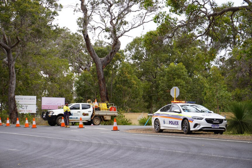 Emergency services vehicle at a roadblock