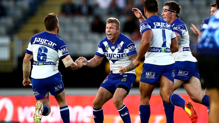 The Bulldogs' Trent Hodkinson celebrates his field goal against the Warriors in April 2014.