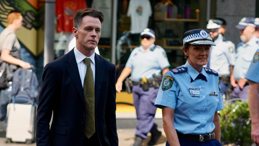 Premier Chris Minns and Police Commissioner Karen Webb walking outside Bondi