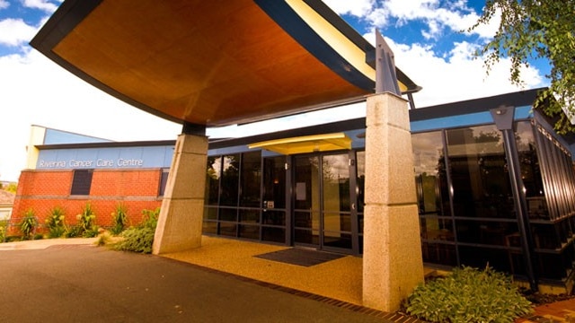 The entrance to a modern-looking medical building.