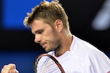 Stanislas Wawrinka celebrates a point against Tomas Berdych