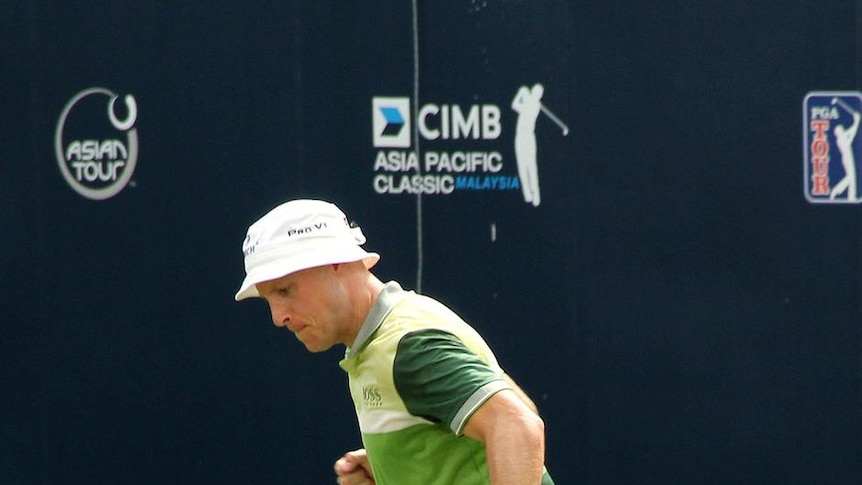 Putting to victory: Ben Crane celebrates on the 18th.