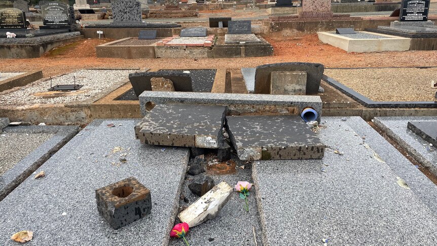 Headstones desecrated at Crystal Brook cemetery.