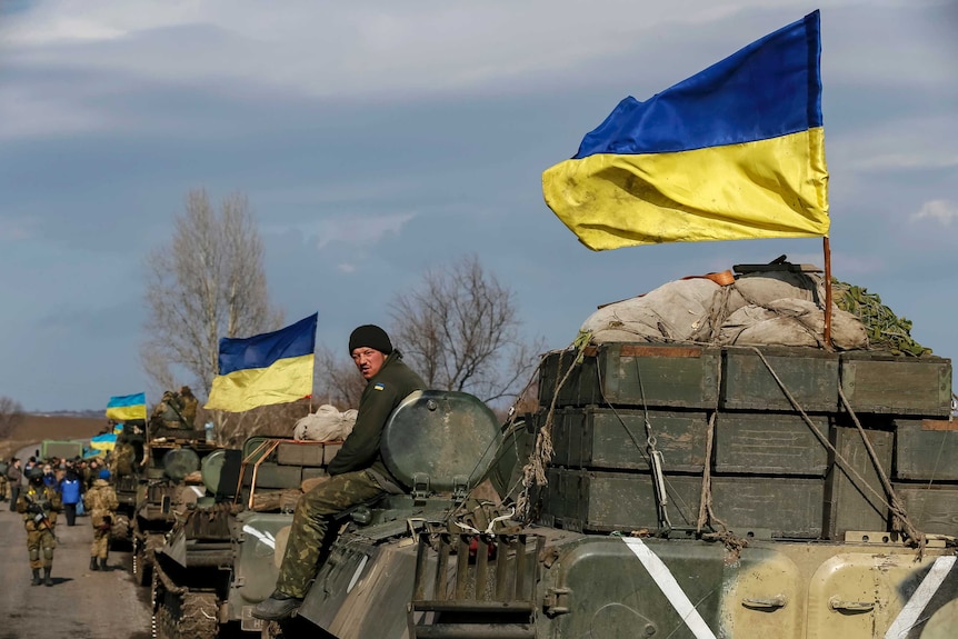 A convoy of Ukrainian armed forces prepare to pull back from Debaltseve in eastern Ukraine