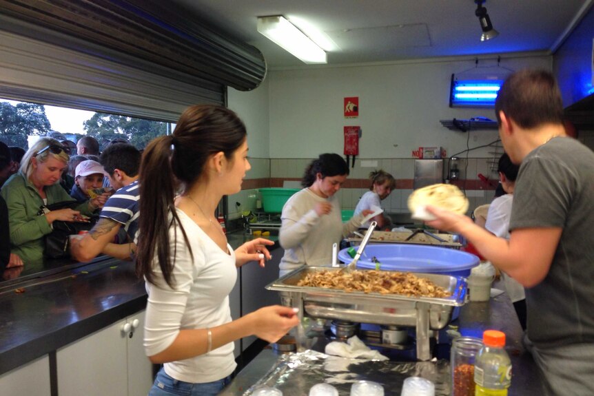 Busy canteen at Bentleigh Greens match prepares souvlakis