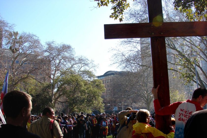 The World Youth Day cross is shown to the crowd