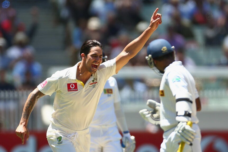 First of two ... Mitchell Johnson snares Prasanna Jayawardene before dismissing Dhammika Prasad the very next ball.