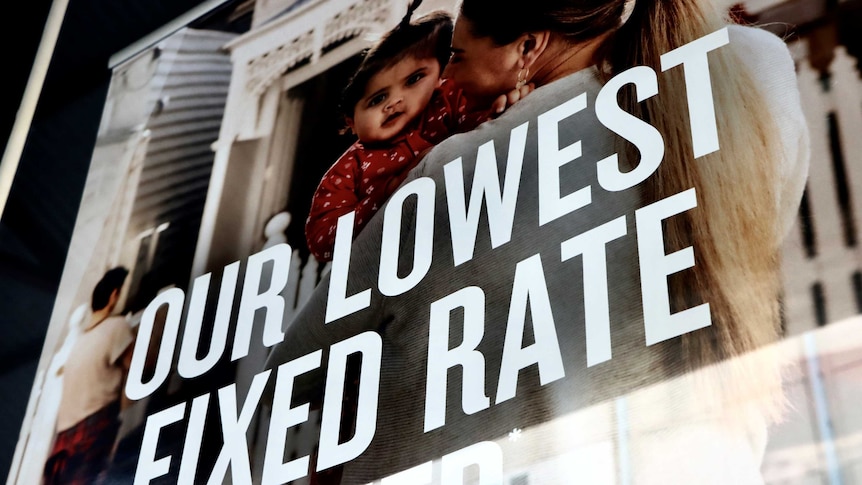 An advertisement in an unidentifiable bank window saying "Our lowest fixed rate ever".