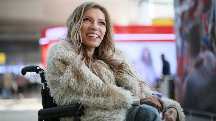 Russian singer Yulia Samoylova poses while sitting in a wheelchair at Sheremetyevo airport outside Moscow. March 17, 2017.