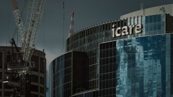 A dark shot of the iCare building in Sydney