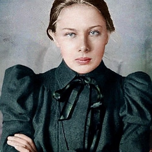 A stern looking woman in black shirt